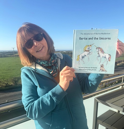 Author, Maureen Gill-Beedie, with Bertie and the Unicorns hardcover